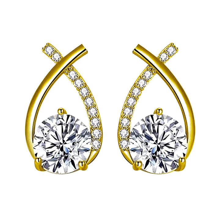 Damen-Ohrringe Arielle™ von Rose & Oliver mit elegantem Gold-Design, raffinierte Details sind auf dem Bild sichtbar.