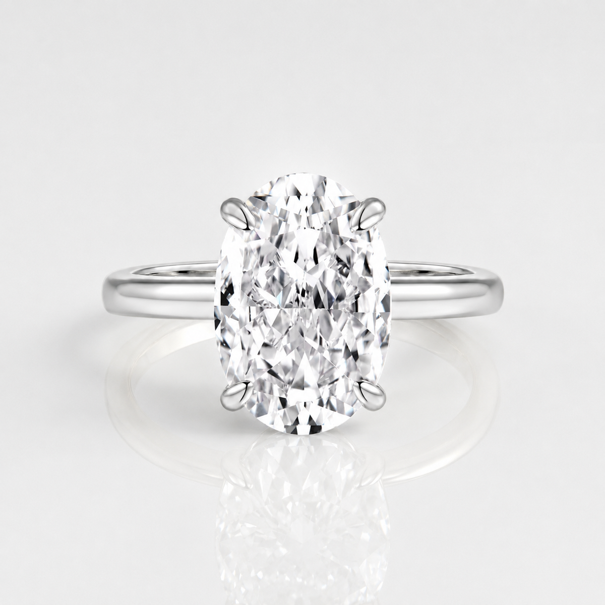 Ovaler Diamantring aus Gold, Solitär der Marke Rose & Oliver, mit funkelndem Zentralstein und elegantem Finish.